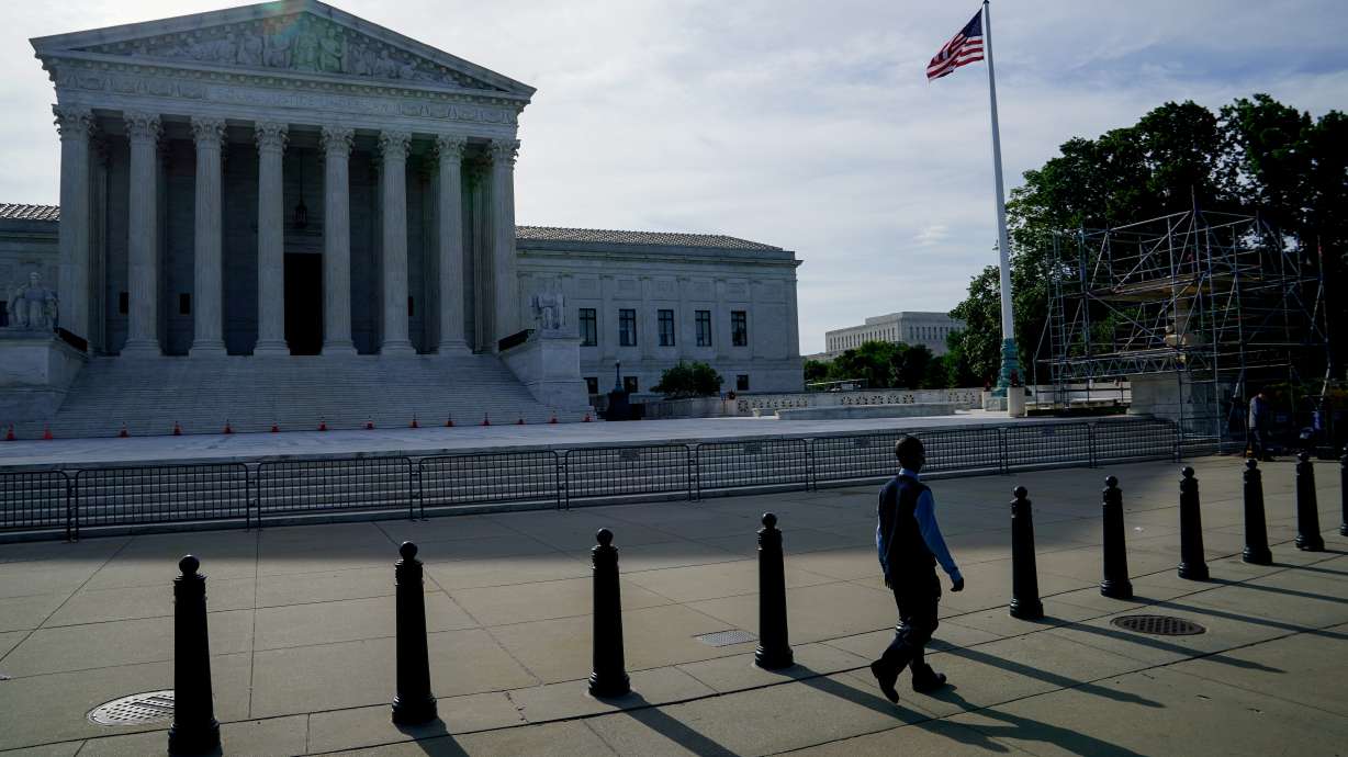 FILE: People walk past the U.S. Supreme Court in Washington D.C., U.S., June 1, 2021. Reuters/Erin Scott.