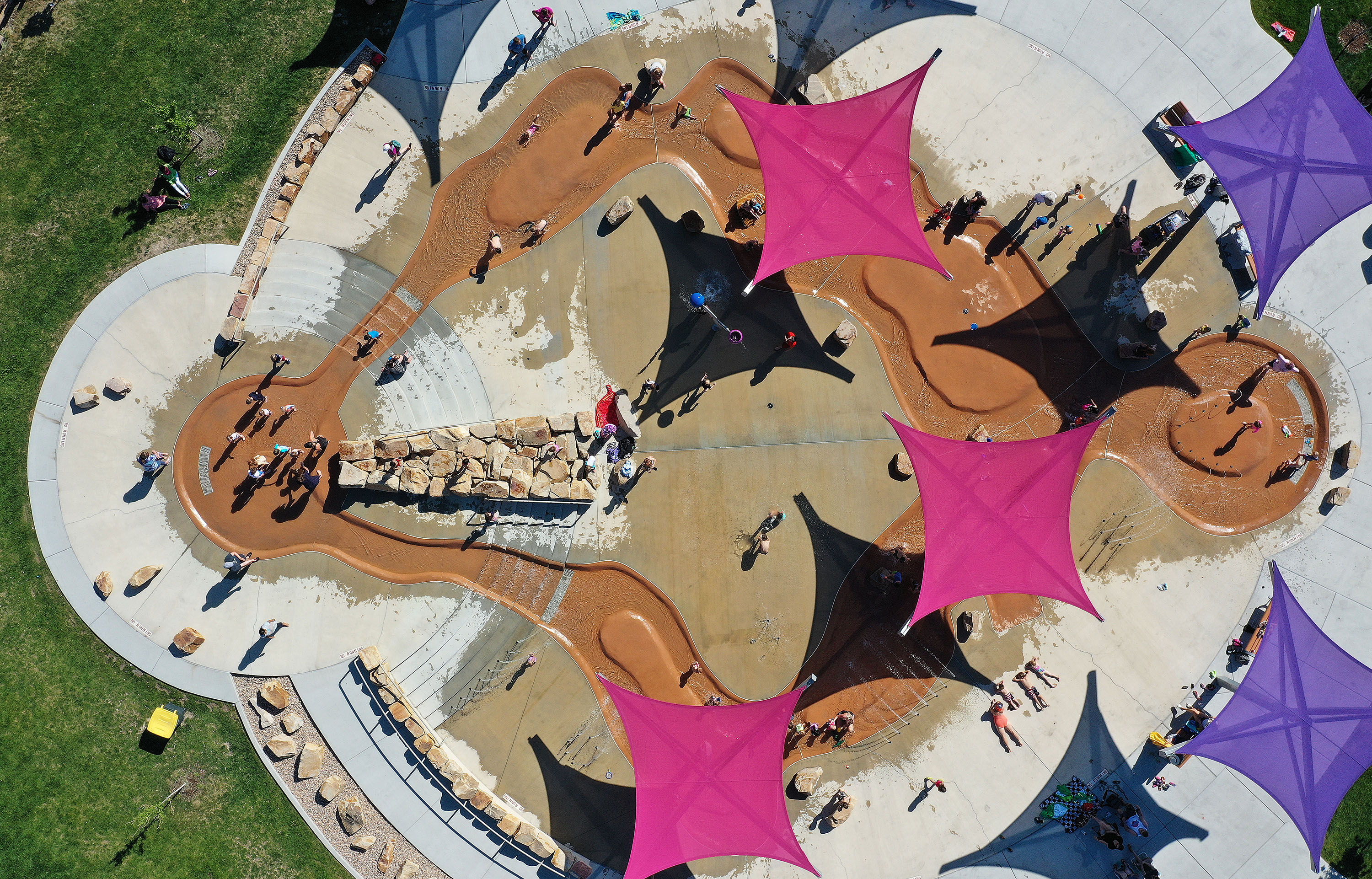 Children cool off at the splash pad in Draper on Thursday, June 3, 2021.