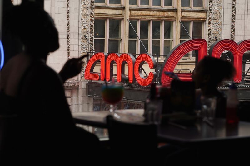 FILE PHOTO: An AMC theatre is pictured in Times Square in the Manhattan borough of New York City, New York, U.S., June 2, 2021.  REUTERS/Carlo Allegri