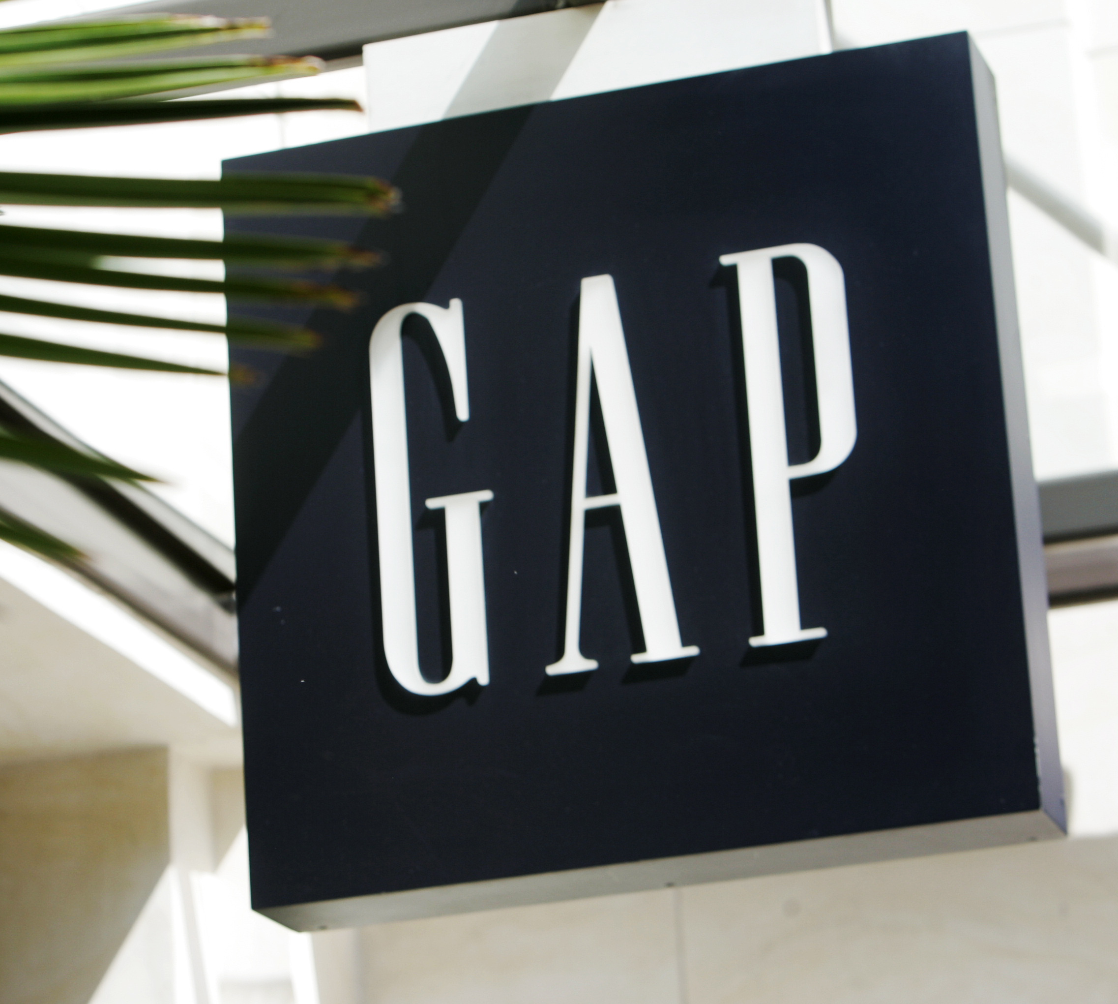 In this Thursday, April 12, 2007 file photo, A sign at a Gap store is seen in The Grove shopping area in Los Angeles. A dozen retailers including Gap and H&M are collaborating on a campaign this fall to enlist customers to combat bad behavior against retail workers. The campaign is being spearheaded by Open to All and two other groups, and comes as workers face increased harassment as they try to enforce social distancing and mask protocols during the pandemic.  (AP Photo/Reed Saxon, File)