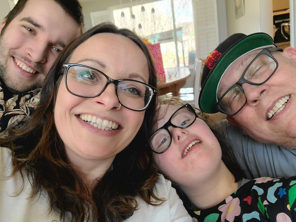 Sally Carter is pictured with her husband and two kids. Carter discovered her husband's cancer relapsed during the pandemic. It was a challenging time for the entire family, but Carter says the experience solidified the belief she has that you can always make the best out of any situation.