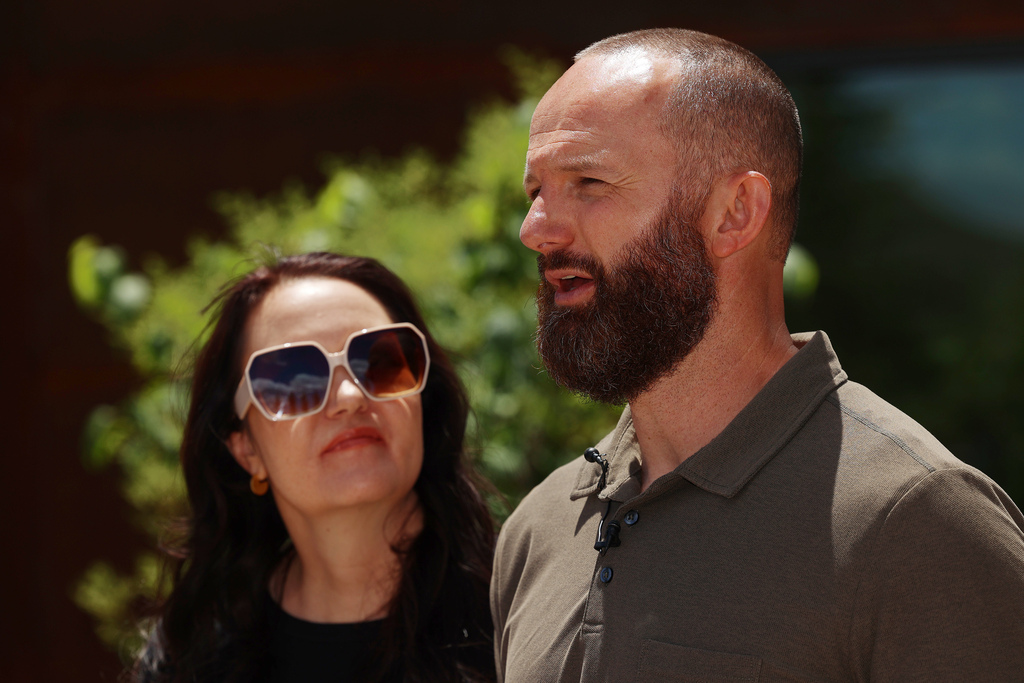 Kacie Malouf, chairwoman of the Malouf Foundation, left, and her husband, Sam, the foundation's president, speak at a press conference in Park City on June 8. The foundation announced on Tuesday it has created a new scholarship fund for survivors to pursue a bachelor's degree at Southern Utah University.