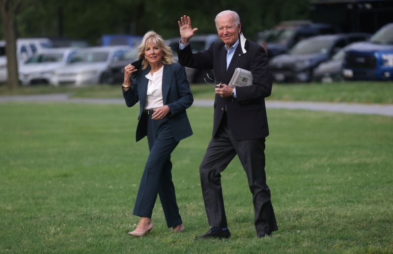 U.S. President Joe Biden and first lady Jill Biden walk to board Marine One for travel to the G7 Summit in the UK from the Ellipse at the White House in Washington, U.S., June 9, 2021.