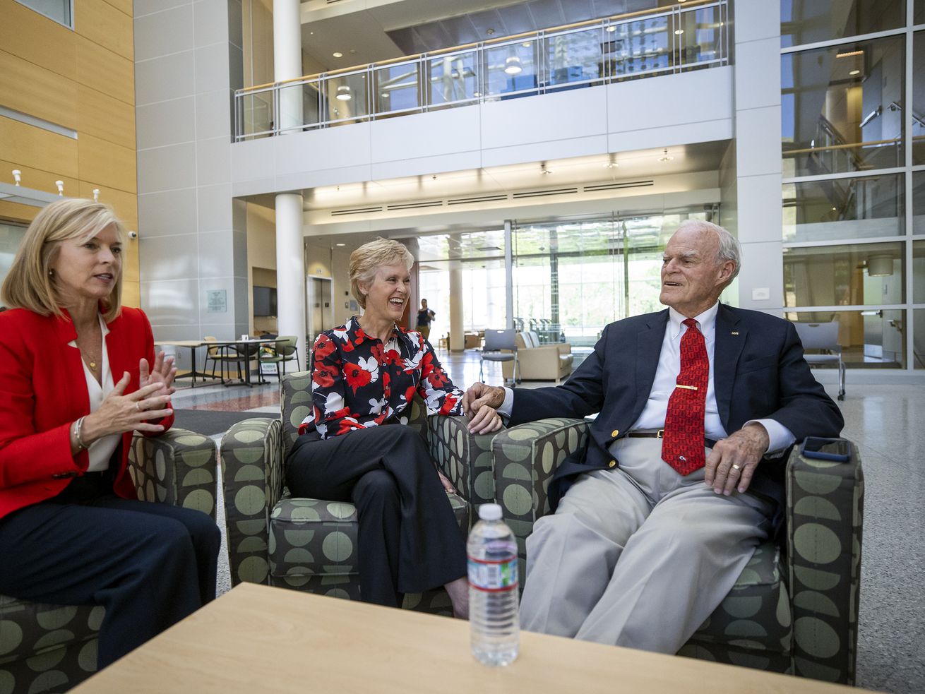 Lisa Eccles and Katie Eccles sit with their father,
Spencer F. Eccles, for an interview inside the Eccles Health
Sciences Education Building at the University of Utah on Tuesday,
June 8, 2021. The University of Utah is announcing a landmark gift
to its School of Medicine.