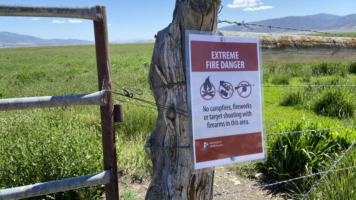 A sign posted at a Utah wildlife management area on Tuesday, June 8, 2021, informs visitors that campfires, fireworks and target shooting is prohibited due to extreme fire danger.