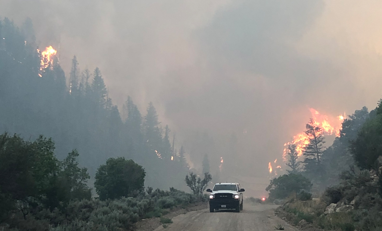 The Bear Fire is seen burning about 4 miles northwest of Helper in Carbon County on Wednesday, June 9, 2021.