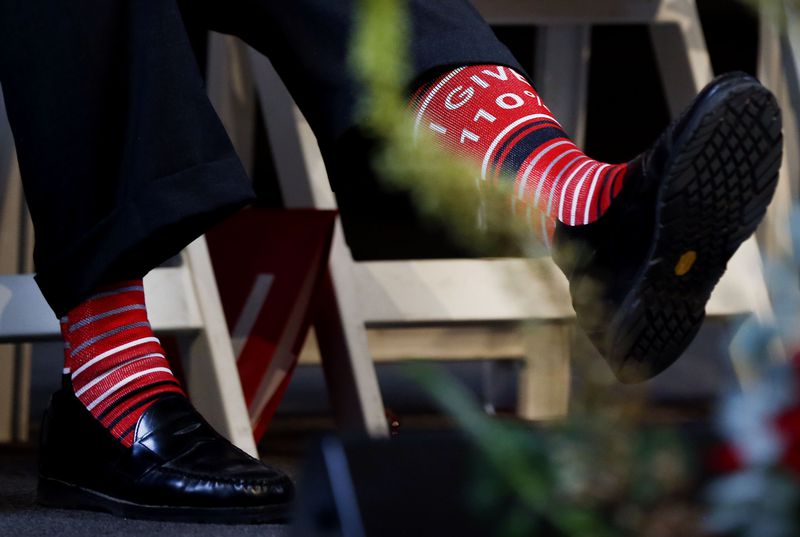 Spencer Eccles, Chairman and CEO of the George S. and Dolores Doré Eccles Foundation and the Nora Eccles Treadwell Foundation, shows off his “I Give 110%” socks at the announcement of a landmark gift to the University of Utah’s School of Medicine in Salt Lake City on Wednesday, June 9, 2021.