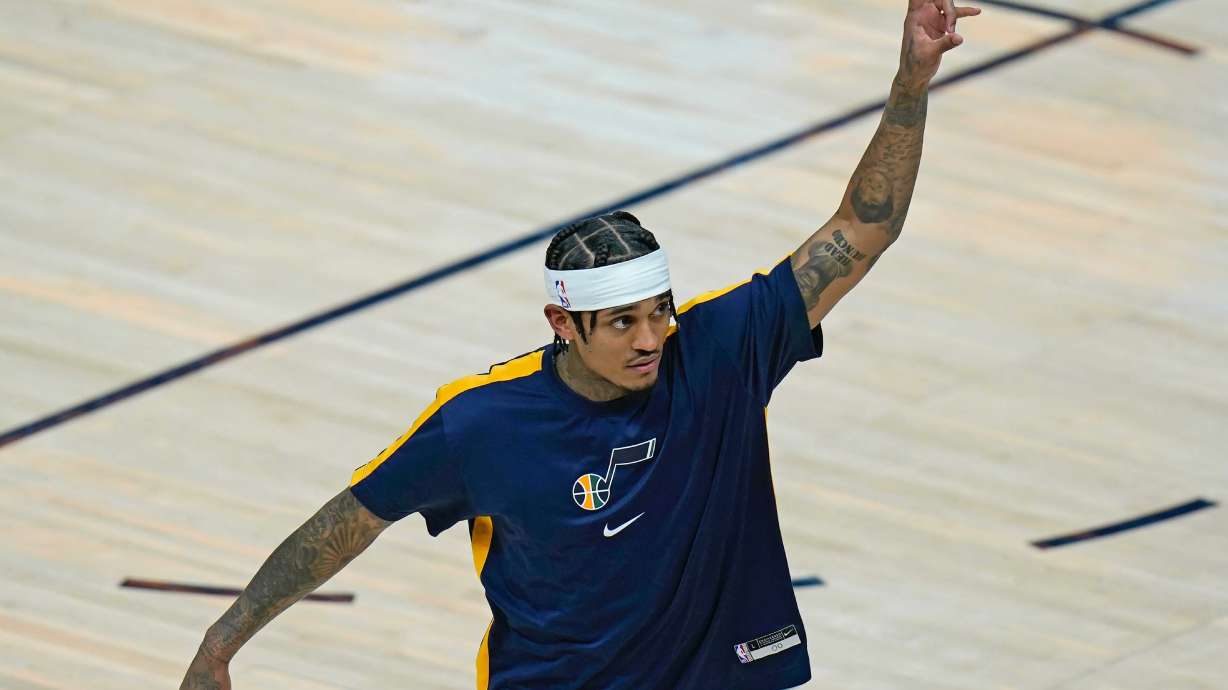 Utah Jazz guard Jordan Clarkson waves to fans as he walks off the court following the team's NBA basketball game against the San Antonio Spurs on Wednesday, May 5, 2021, in Salt Lake City.