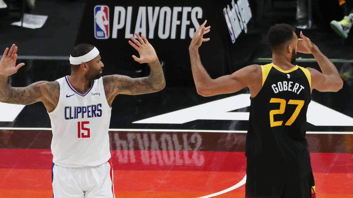 LA Clippers center DeMarcus Cousins (15) and Utah Jazz center Rudy Gobert (27) complain to the ref during the NBA playoffs in Salt Lake City on Thursday, June 10, 2021. The Jazz won 117-111.