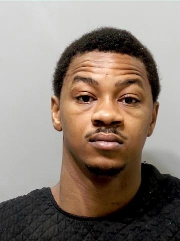 Former Michigan State star to remain in jail in murder case