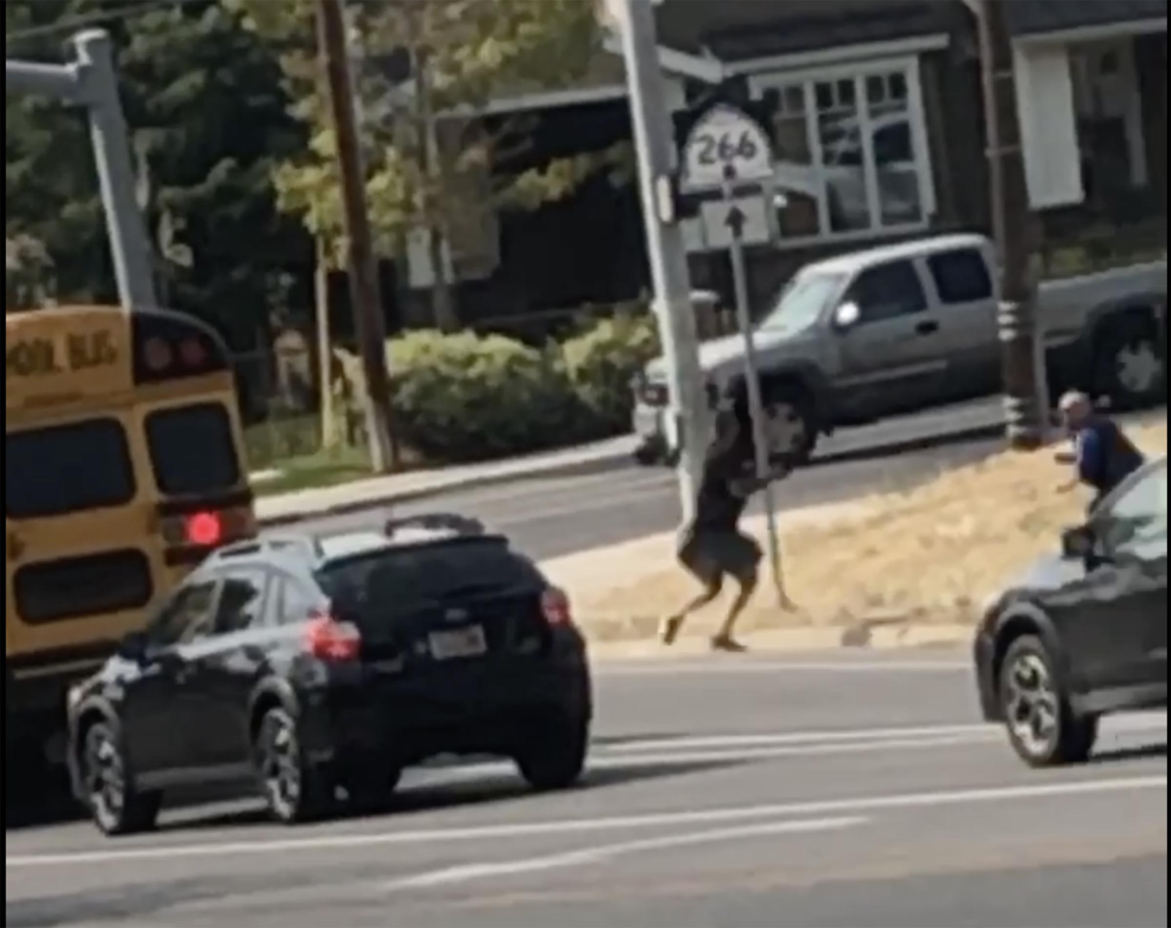 A man is seen in a video screen grab, left, being chased near 4500 South and 2300 East in Holladay on Thursday, Sept. 17, 2020. Moments later, the man falls to the ground after he was shot by police. The shooting was determined Friday to be legally justified.