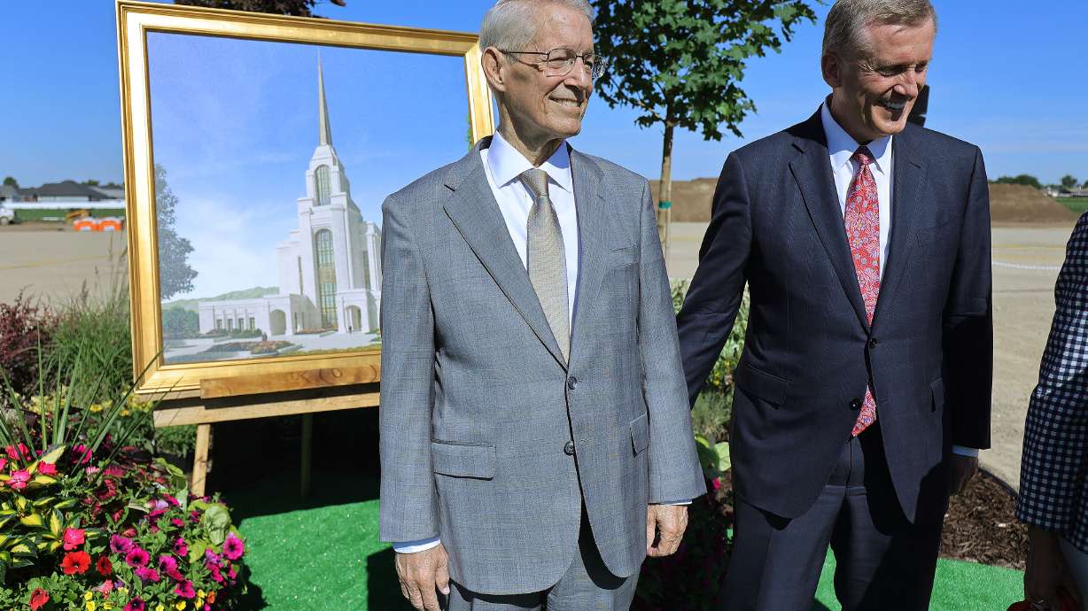 Elder Dean M. Davies and Elder Kevin R. Duncan, General Authority Seventy, smile prior to the groundbreaking ceremony for the Syracuse Utah Temple of The Church of Jesus Christ of Latter-day Saints in Syracuse on June 12. Elder Davies died Tuesday at the age of 69 after a long battle with cancer.