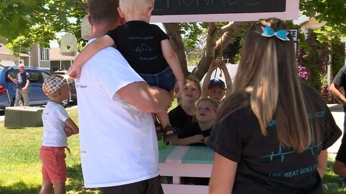 Sisters Myleigh and Makayla Madsen ran a lemonade stand in honor of their late sister Makenzie.