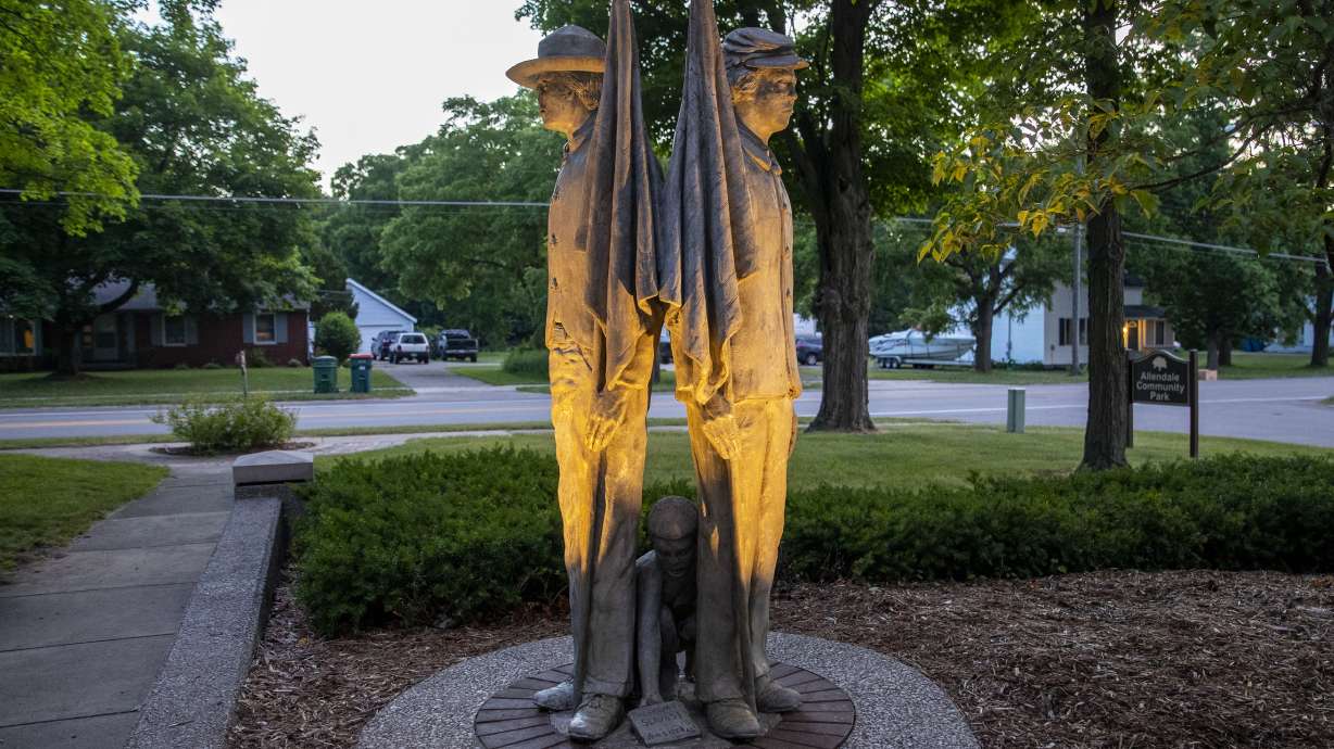 Michigan town to keep statue of Black child, South soldier