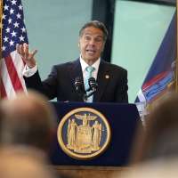 NY lifts more COVID-19 rules as it hits vaccination mark