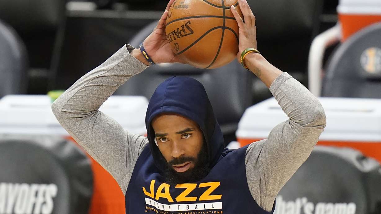 Utah Jazz guard Mike Conley stands on the court before Game 1 of the team's second-round NBA basketball playoff series against the Los Angeles Clippers on Tuesday, June 8, 2021, in Salt Lake City. Conley suffered a mild right hamstring strain in Game 5 against the Grizzlies, and he has been ruled out of Tuesday night's game.