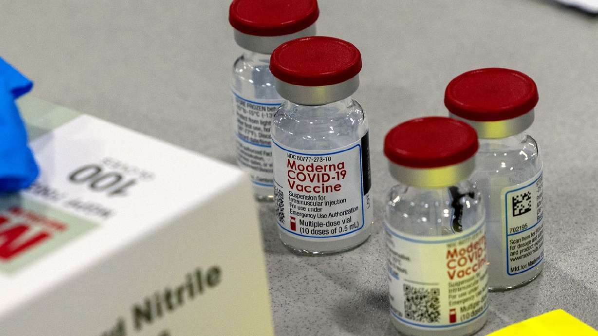 Vials of Moderna’s COVID-19 vaccines sit on a table at
the Mountain America Exposition Center in Sandy on Tuesday, May 18,
2021.