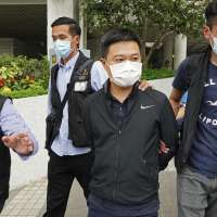 Editors of Hong Kong newspaper arrested under security law