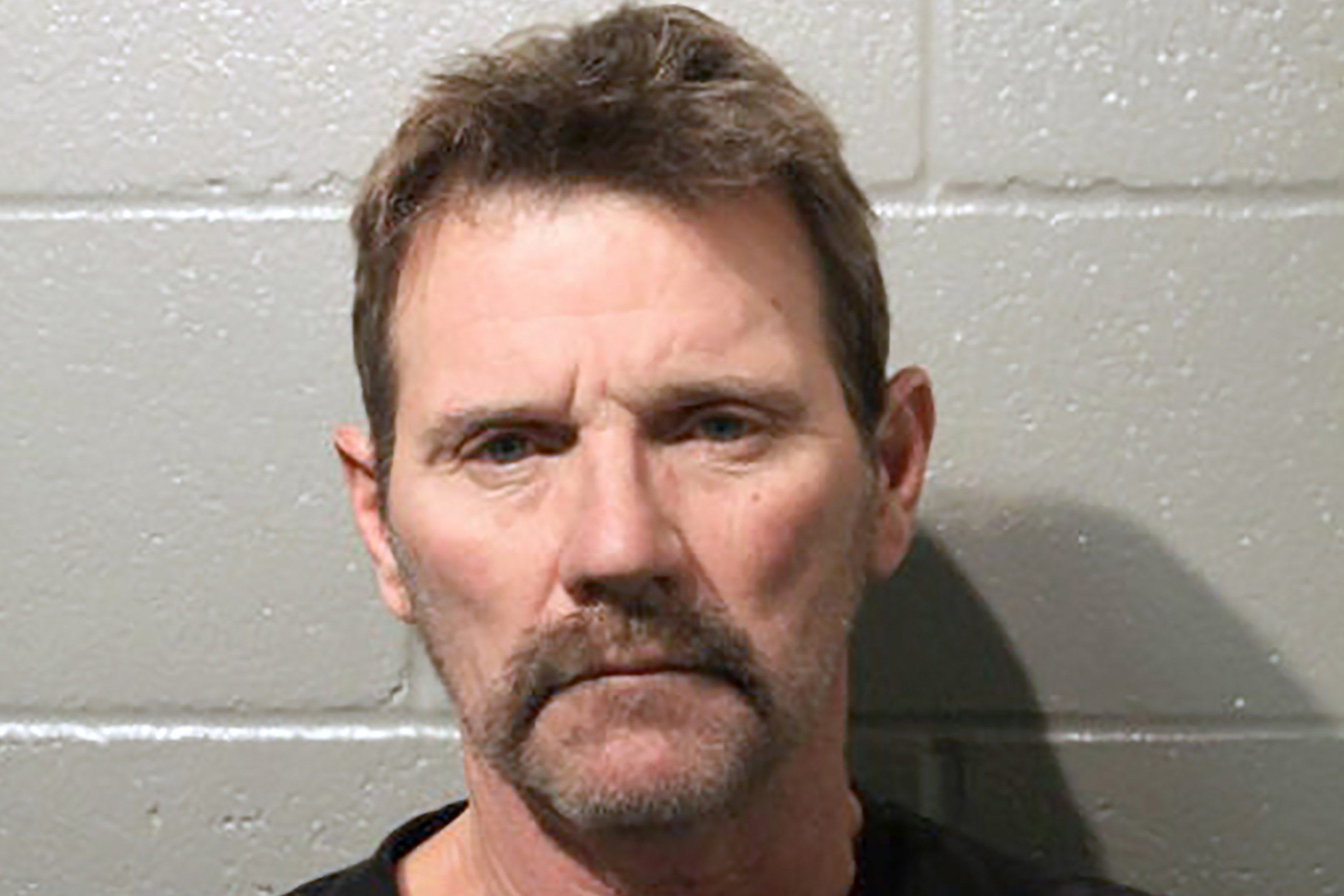 Defense: Man lost consciousness before driving into students