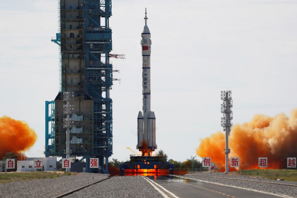 The Long March-2F Y12 rocket, carrying the Shenzhou-12 spacecraft and three astronauts, takes off from Jiuquan Satellite Launch Center for China's first manned mission to build its space station, near Jiuquan, Gansu province, China June 17, 2021.