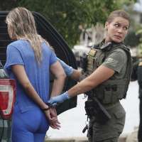 Officials detain 14 migrants who came ashore in Florida