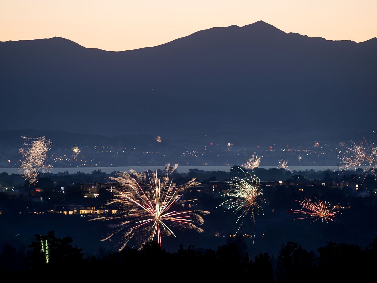 Amateur fireworks are seen from Rock Canyon Park in Provo on Saturday, July 4, 2020. Utah Gov. Spencer Cox would like
to see a ban on fireworks because of the extreme drought conditions.