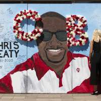 2 more charged in killing of ex-Indiana U. football player