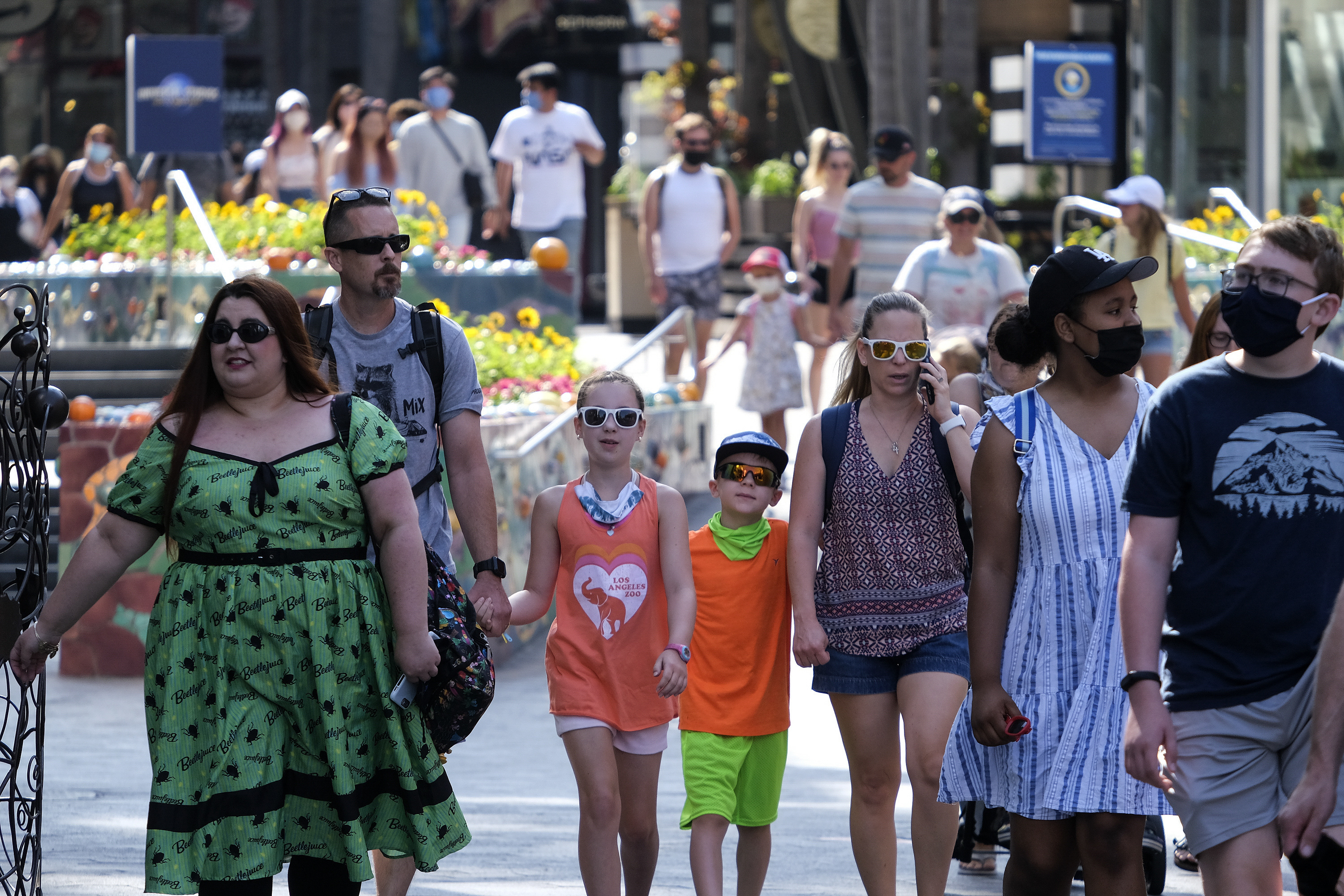 Many Americans are relaxing precautions taken during the COVID-19 pandemic and resuming everyday activities, even as some worry that coronavirus-related restrictions were hastily lifted, according to a new poll from The Associated Press-NORC Center for Public Affairs Research.