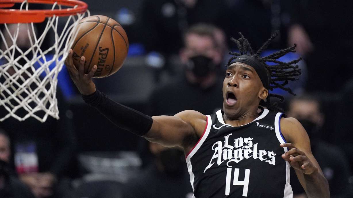 Los Angeles Clippers guard Terance Mann shoots during the second half in Game 6 of a second-round NBA basketball playoff series against the Utah Jazz Friday, June 18, 2021, in Los Angeles.
