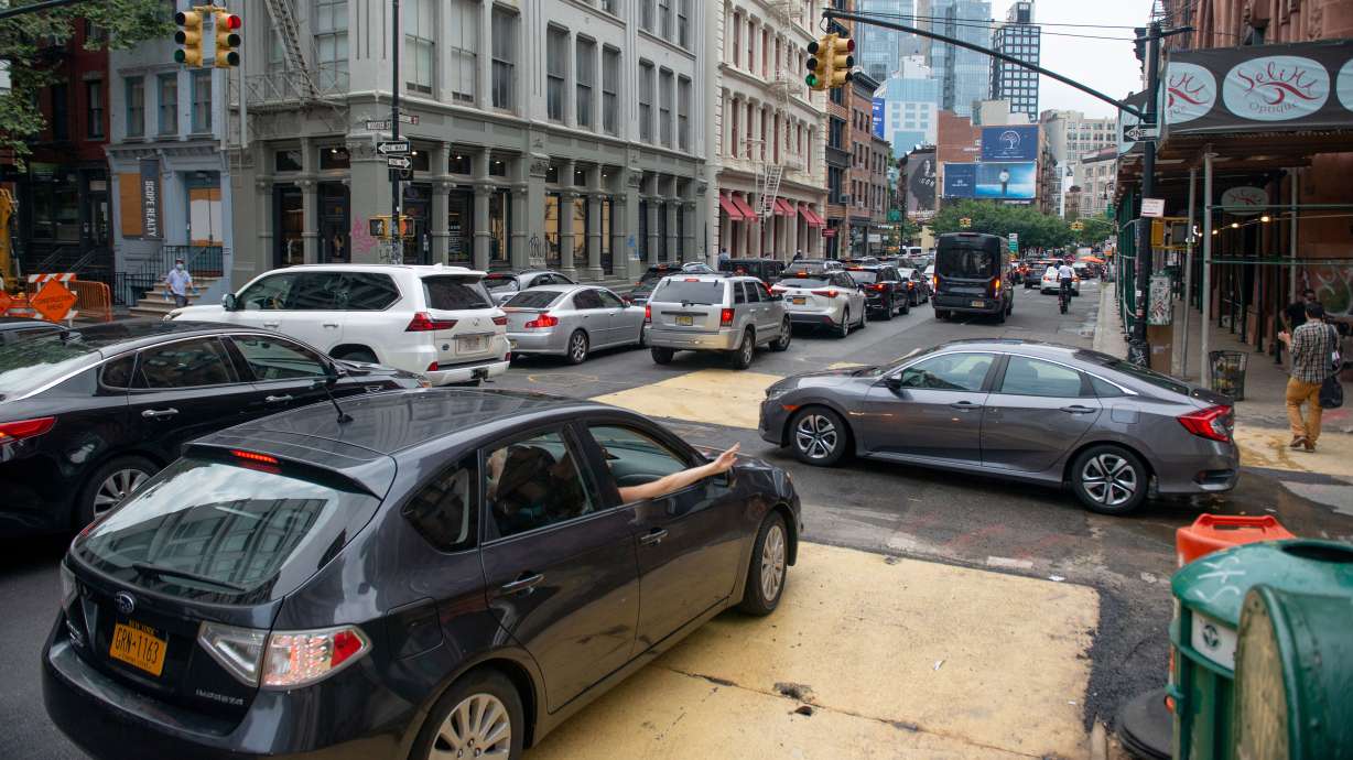 Cars crowd an intersection in the SoHo neighborhood of New York City on Aug. 07, 2020.