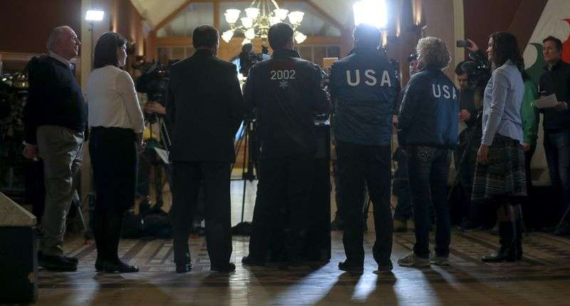 Fraser Bullock, chief operating officer of the 2002
Winter Games, center, talks about the Olympics possibly returning
to Salt Lake City during a press conference at the City-County
Building on Friday, Dec. 14, 2018, after the U.S. Olympic Committee
selected Utah’s capital city to bid on behalf of the United States,
potentially for the 2030 Winter Games.
