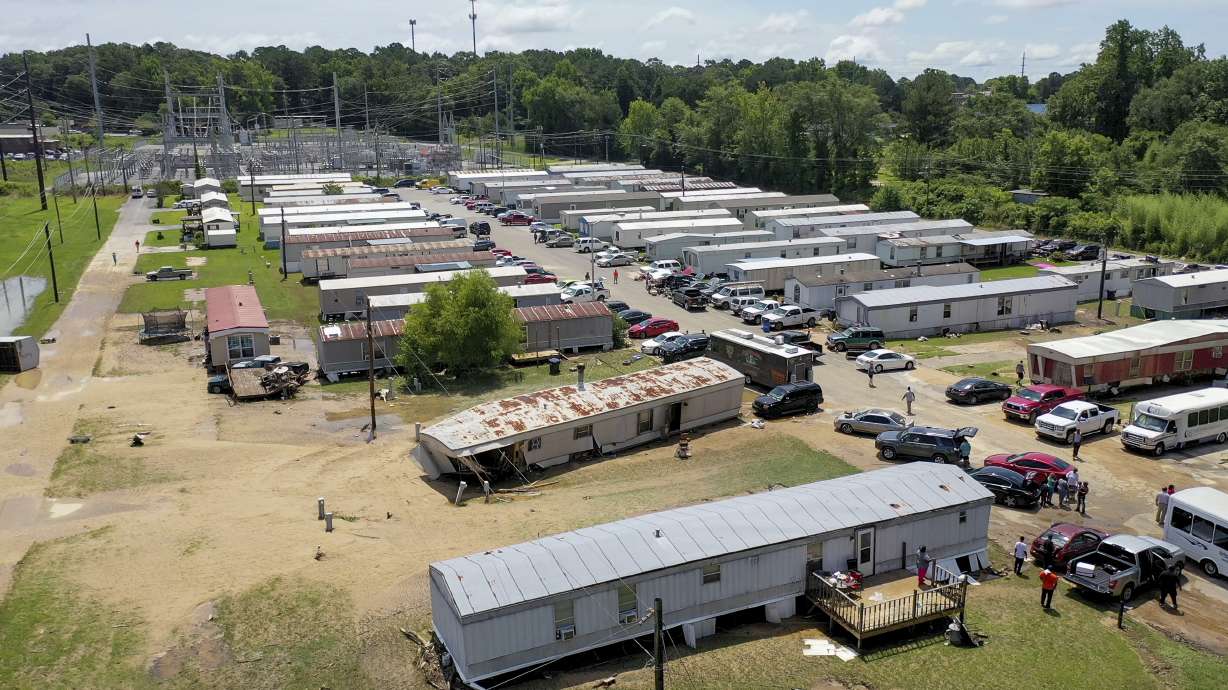 The flooding aftermath from Saturday's severe weather is seen in this aerial drone photo on Sunday, June 20, 2021, in Northport, Ala. Tropical Storm Claudette regained tropical storm status and headed out to sea from the North Carolina coast Monday, less than two days after the system killed at least 14 people in Alabama.