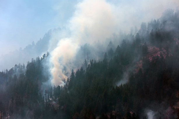 A wildfire burns in Morgan Canyon in Tooele County on
Tuesday, June 22, 2021. The fire started after a plane
crash.