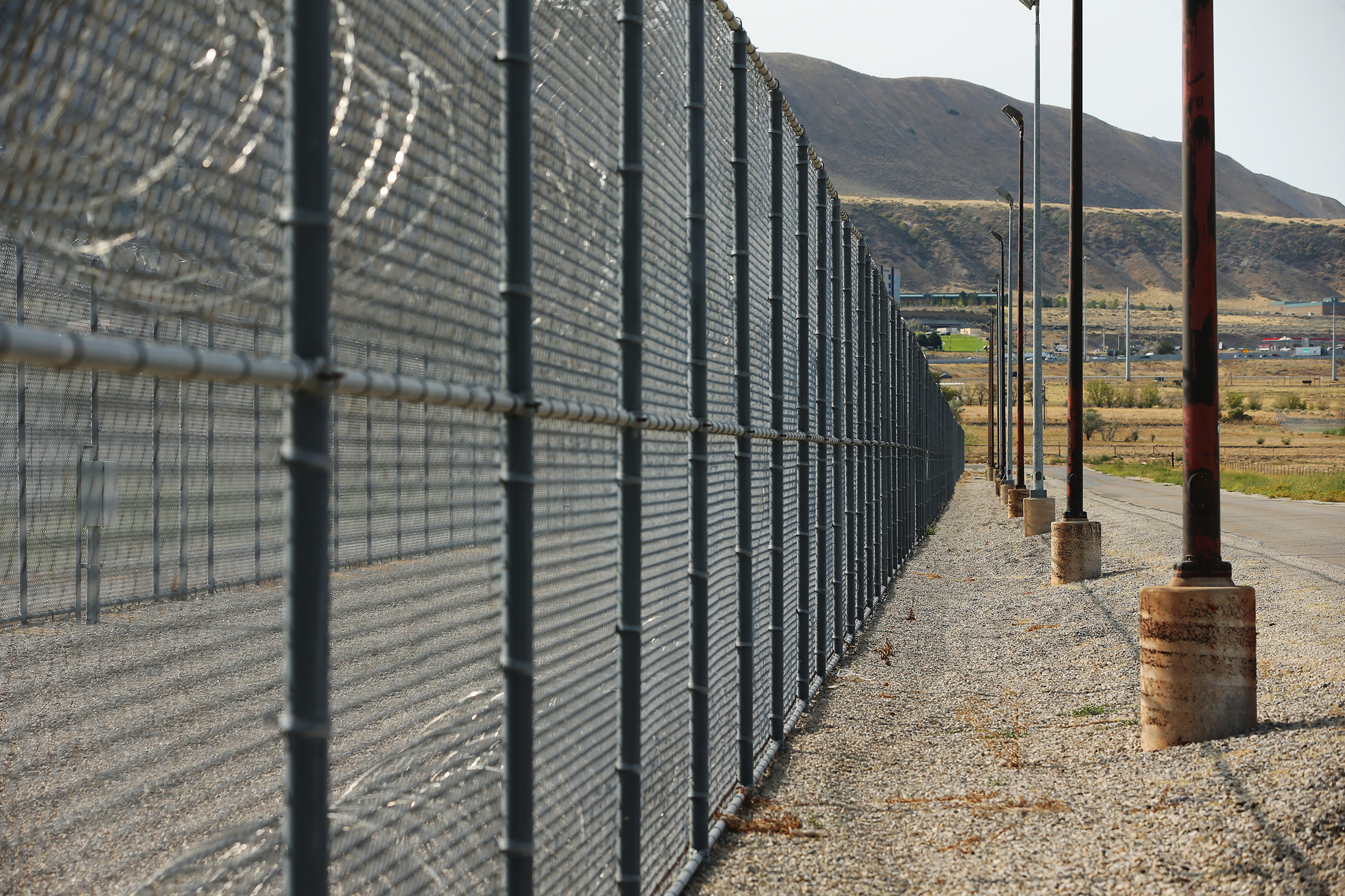 Razor wire and fencing at the Utah State Prison on Monday, Sept 14, 2020. Two men who have served many years behind bars for separate murders have been given parole dates.