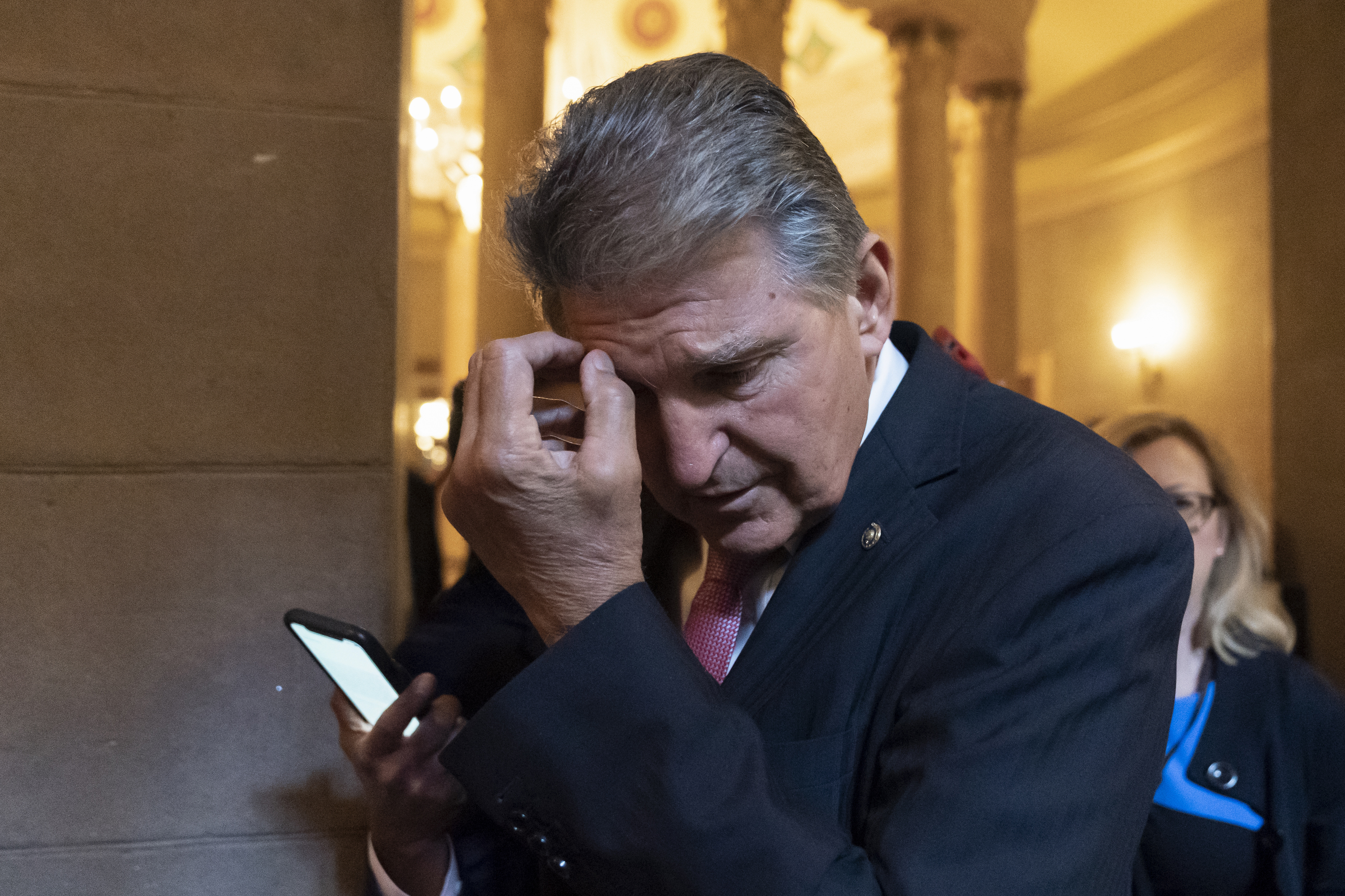 Sen. Joe Manchin, D-W.Va., arrives for a meeting at the Capitol in Washington, Wednesday, June 23, 2021. Congressional negotiators and the White House appear open to striking a roughly $1 trillion deal on infrastructure, but they are struggling with the hard part — deciding who will pay for it.