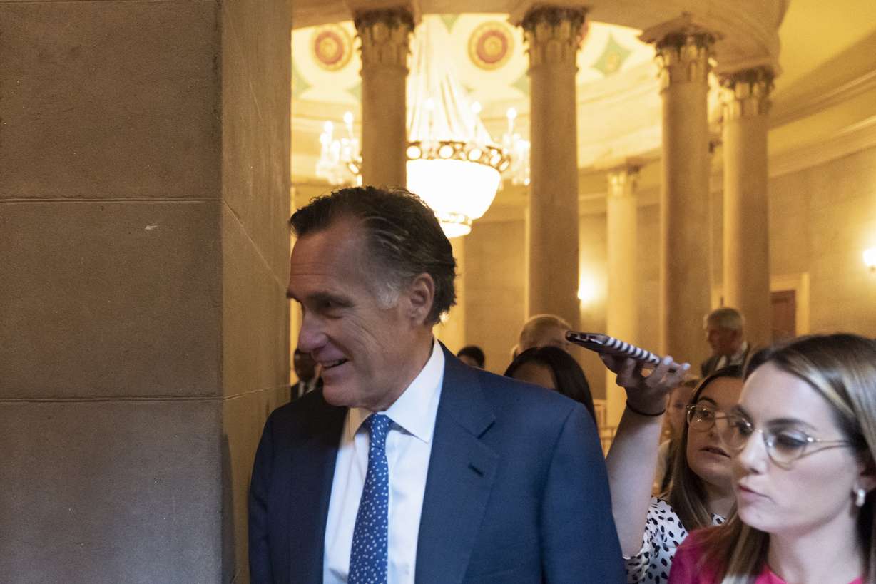 Sen. Mitt Romney, R-Utah, arrives for a meeting at the Capitol in Washington, Wednesday, June 23, 2021. Congressional negotiators and the White House appear open to striking a roughly $1 trillion deal on infrastructure, but they are struggling with the hard part — deciding who will pay for it.