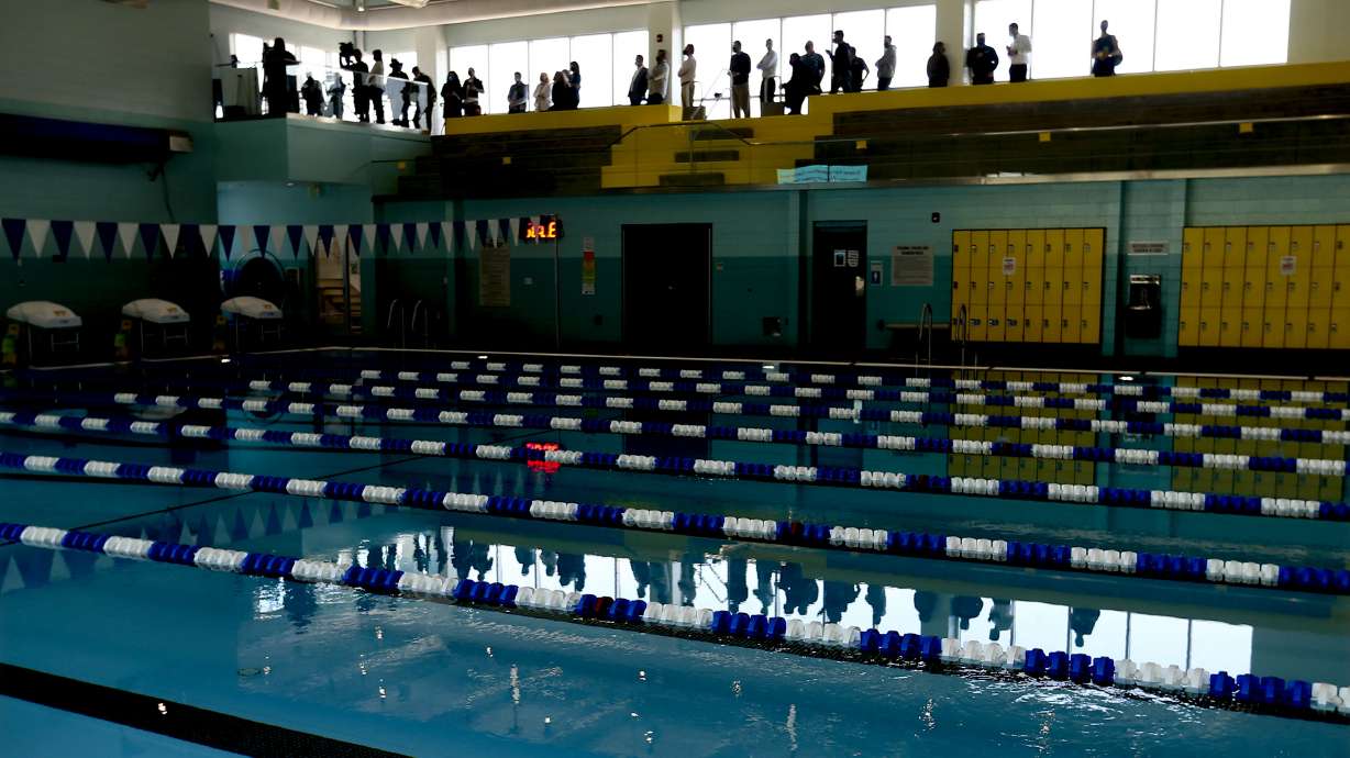 People attend a press conference at the Draper Recreation Center in Draper, Utah on Thursday, April 22, 2021.