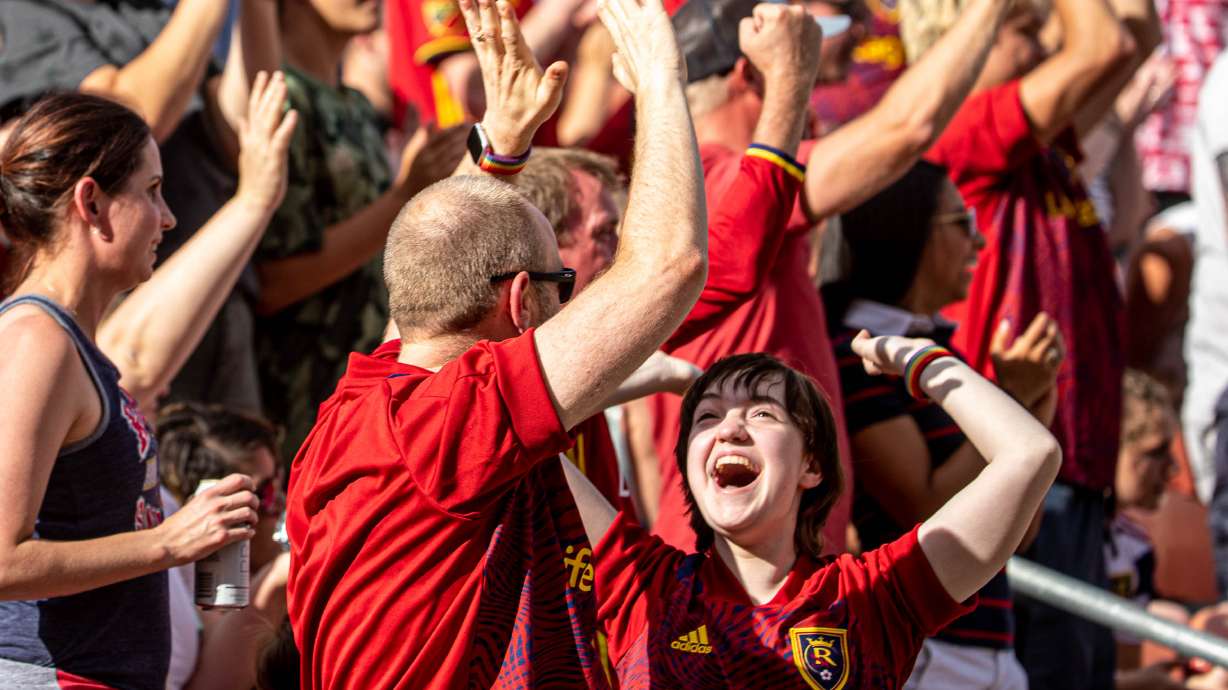 Real Salt Lake fans cheer as RSL and Houston play an MLS soccer game at Rio Tinto Stadium in Sandy on Saturday, June 26, 2021.