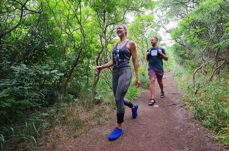 Hannah Hausman and Ethan Watts hike the Living Room
Trail in Salt Lake City on Thursday, June 24, 2021. In response to
the drought, many snakes are out in search of food and water, and
some have recently been spotted in moist areas of city parks and
yards. Of the 31 species of snakes found in Utah, seven are
venomous.
