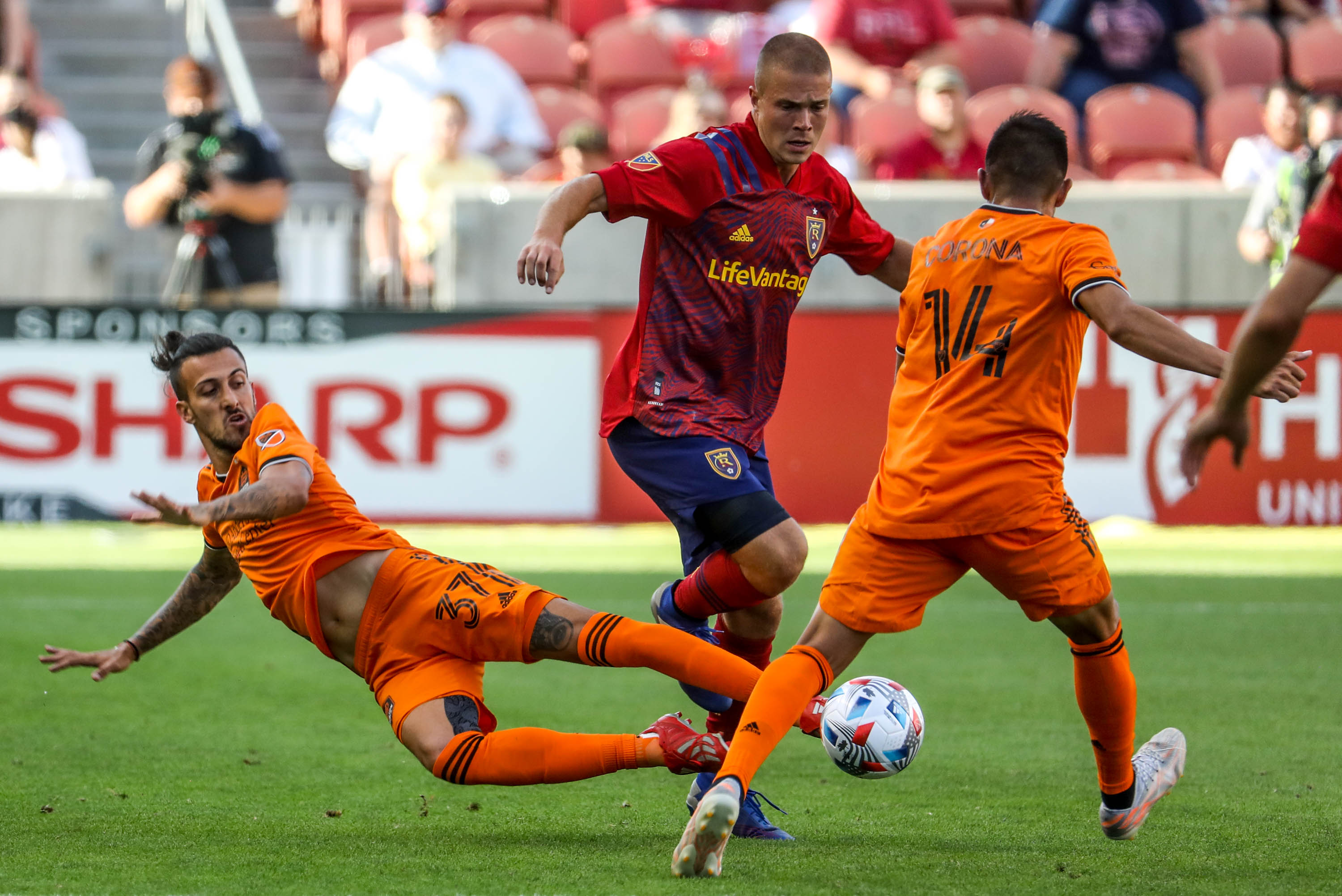 Houston Dynamo forward Maxi Urruti (37) dives for the ball as RSL and Houston play an MLS soccer game at Rio Tinto Stadium in Sandy on Saturday, June 26, 2021.