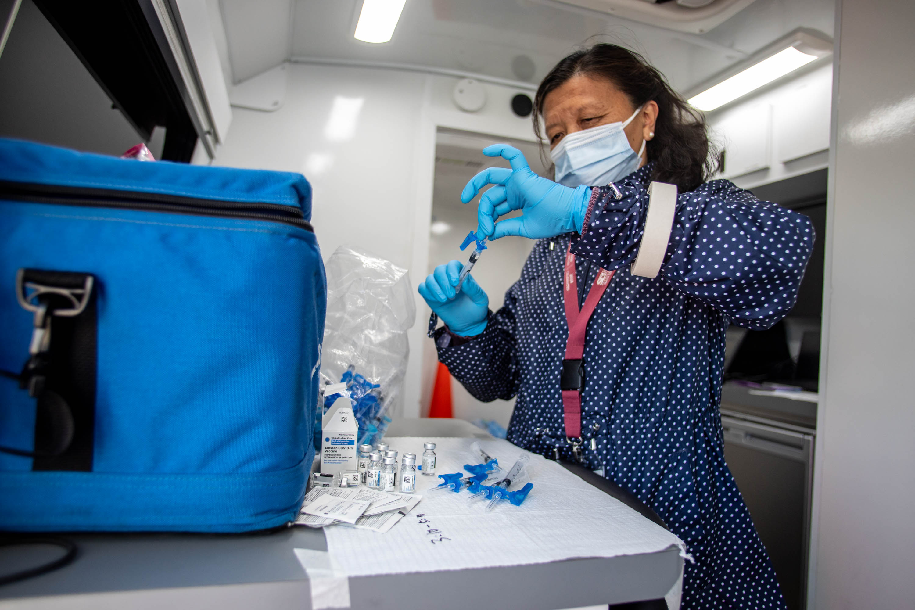 Health care worker Qing Chong prepares COVID-19 vaccines for a pop-up vaccination event at Reams in Magna on Monday, May 3, 2021. Health officials reported 282 new coronavirus cases on Sunday.
