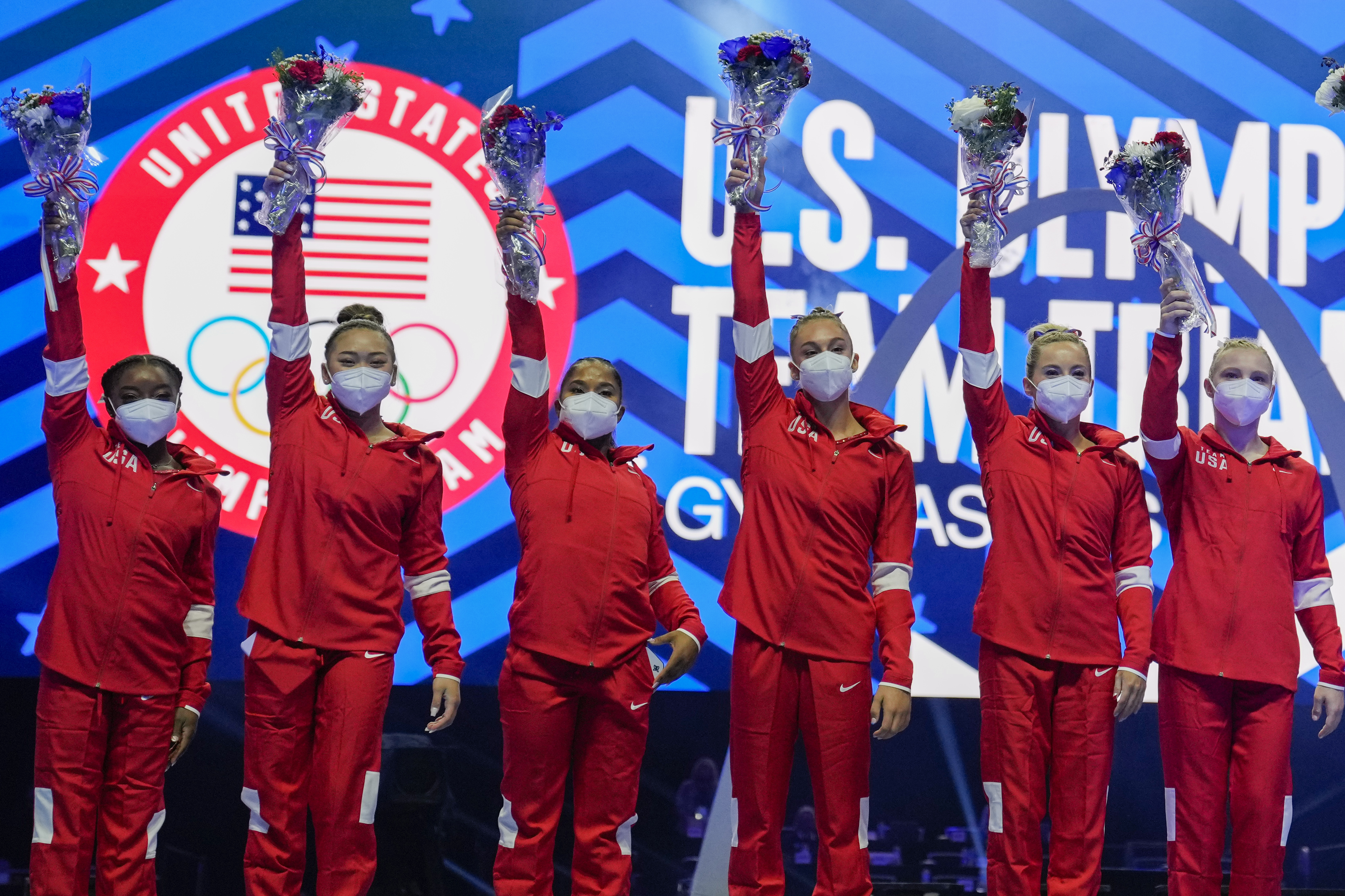 Members of the U.S. Women's Olympic Gymnastic Team, Simone Biles, Suni Lee, Jordan Chiles, and Grace McCallum plus individual members MyKayla Skinner and Jade Carey (L-R) are announced after the U.S. Olympic Gymnastics Trials Sunday, June 27, 2021, in St. Louis.