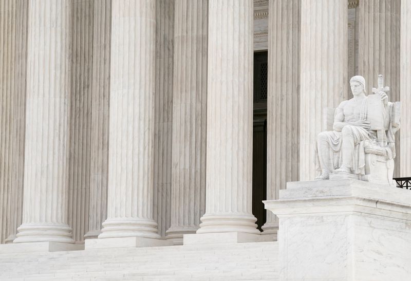 The Authority of Law statue is pictured outside the U.S. Supreme Court building in Washington, D.C., June 25, 2021. The court declined to take up a major transgender rights case Monday, June 28, 2021.