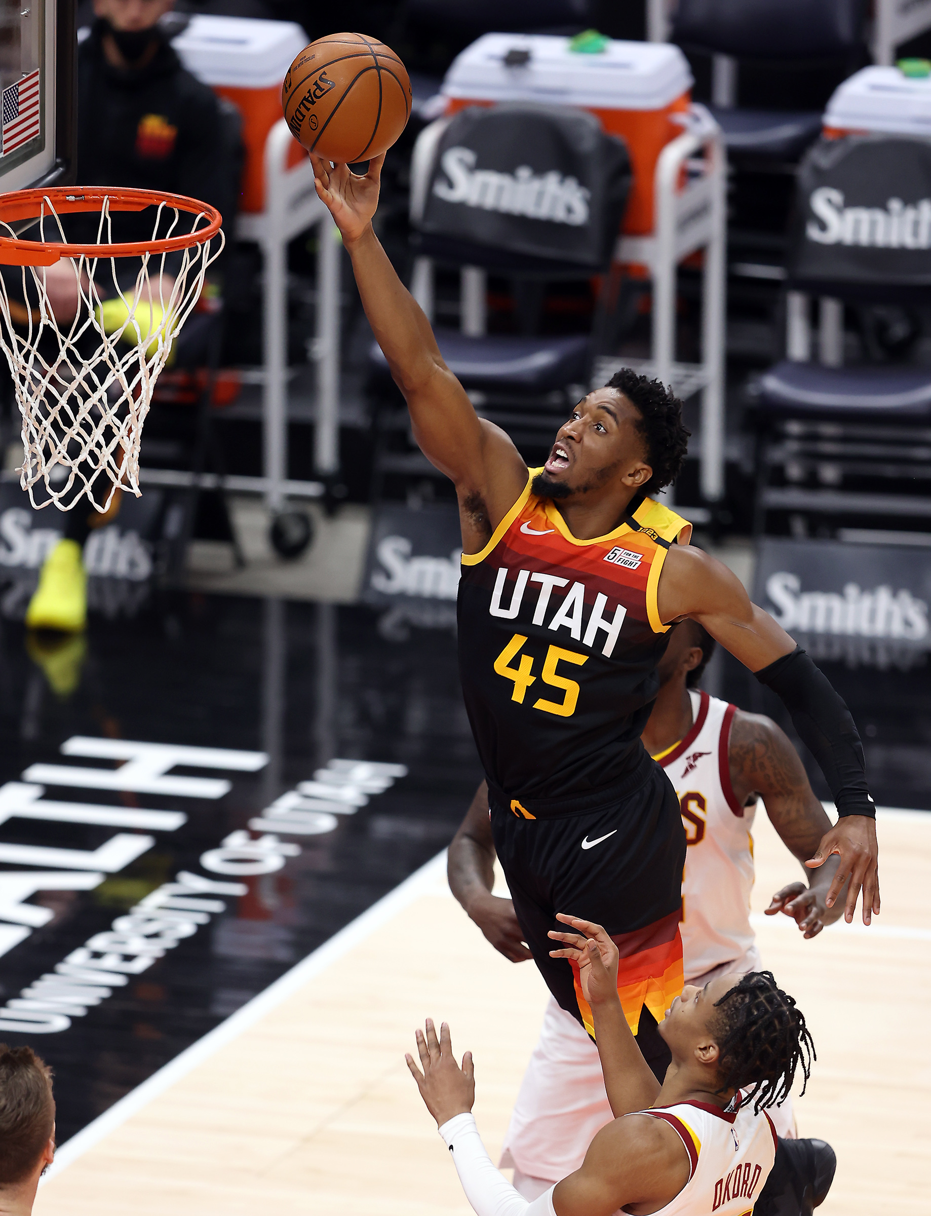 Utah Jazz guard Donovan Mitchell (45) puts in a lay-up as the Utah Jazz and the Cleveland Cavaliers play an NBA basketball game at Vivint Smart Home Arena in Salt Lake City on Monday, March 29, 2021. In a recent article in GQ magazine, Mitchell said he wanted to talk with Utah legislators about critical race theory.