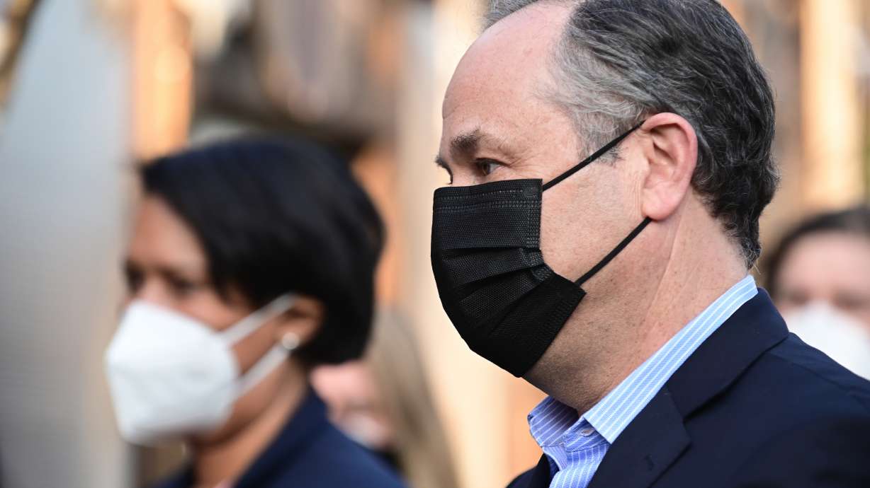 Doug Emhoff, husband of Vice President Kamala Harris, and Washington Mayor Muriel Bowser, left, talk with members of the press about a COVID-19 relief effort in Washington, on Monday, March 8, 2021. Emhoff is planning to visit Bryce Canyon National Park in southern Utah this week as part of a tour through southwestern states.