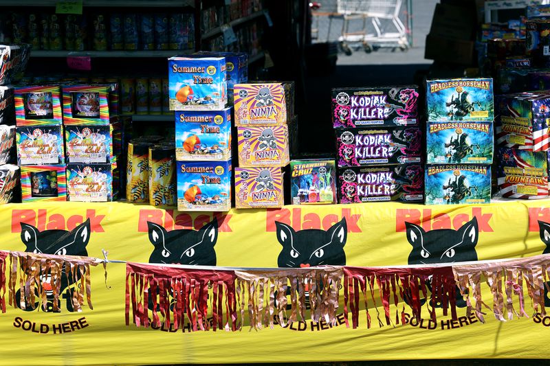 Fireworks sit on tables at Mad Matt’s Fireworks on the
corner of 9000 South and State Street in Sandy on Monday, June 28,
2021.