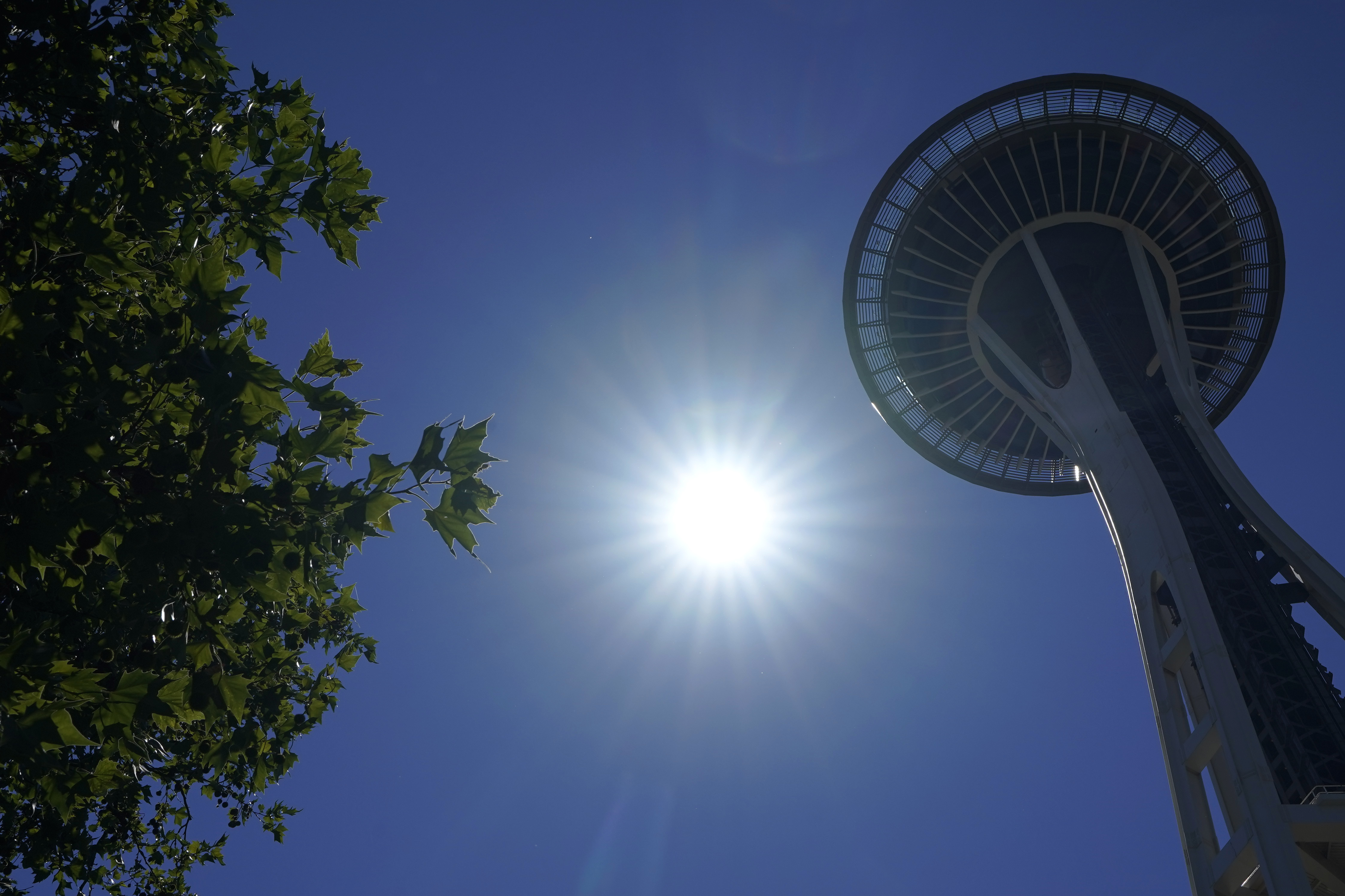 The sun shines near the Space Needle on Monday, June 28, 2021, in Seattle. Many cities in the Pacific Northwest broke all-time heat records over the weekend, with temperatures soaring well above 100 degrees. 