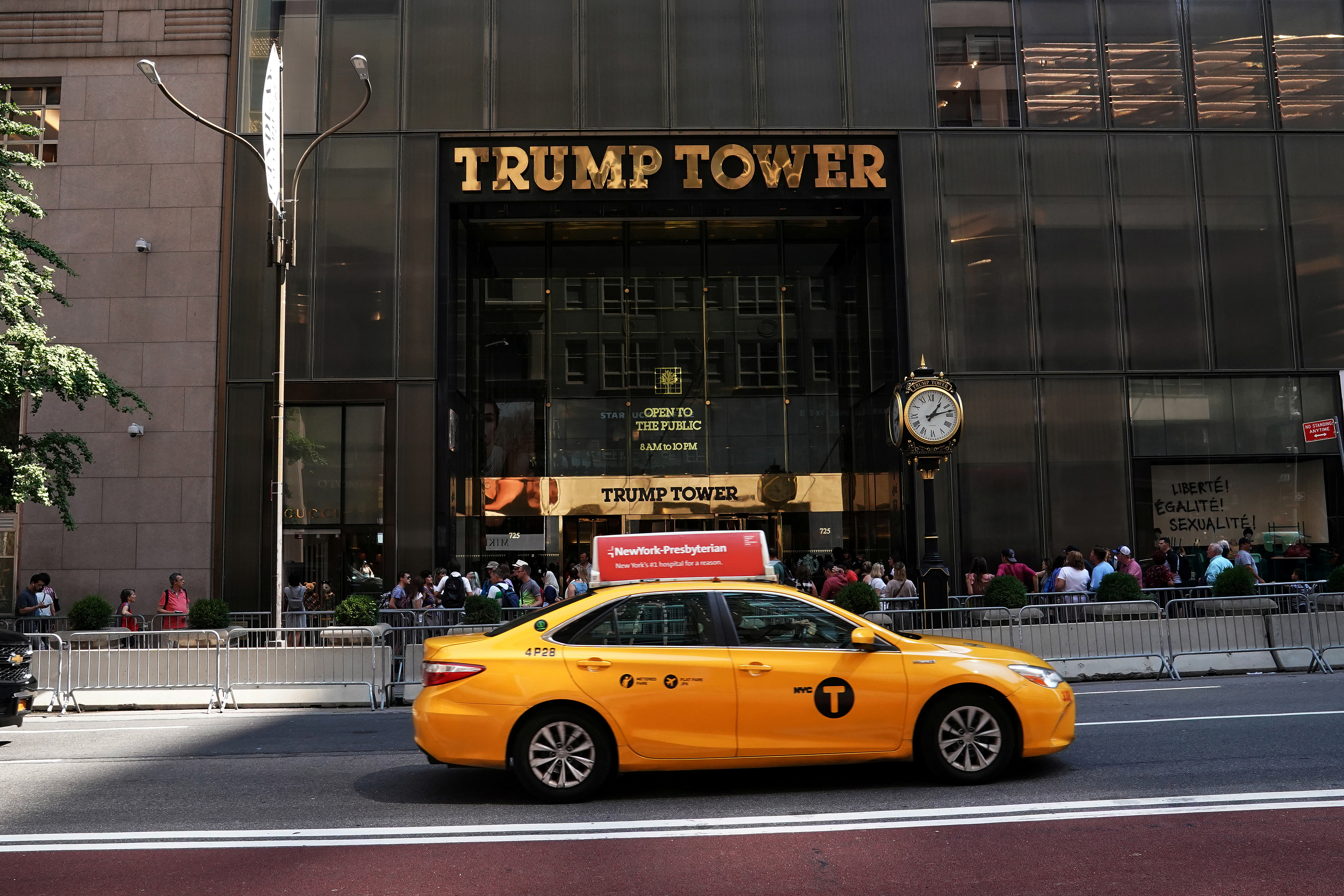 A person walks out of Trump Tower amid the coronavirus disease pandemic in the Manhattan borough of New York City, New York, U.S., January 12, 2021.