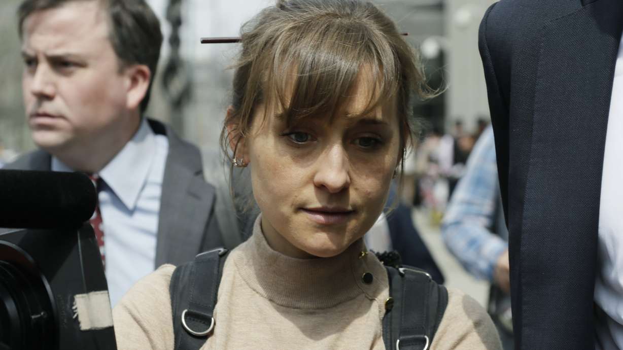 In this Monday, April 8, 2019 photo, actress Allison Mack leaves Brooklyn federal court in New York. Mack, who played a key role in a scandal-ridden, cult-like upstate New York group, is facing sentencing Wednesday, June 30, 2021, after pleading guilty to charges she manipulated women into becoming sex slaves for the group’s spiritual leader.