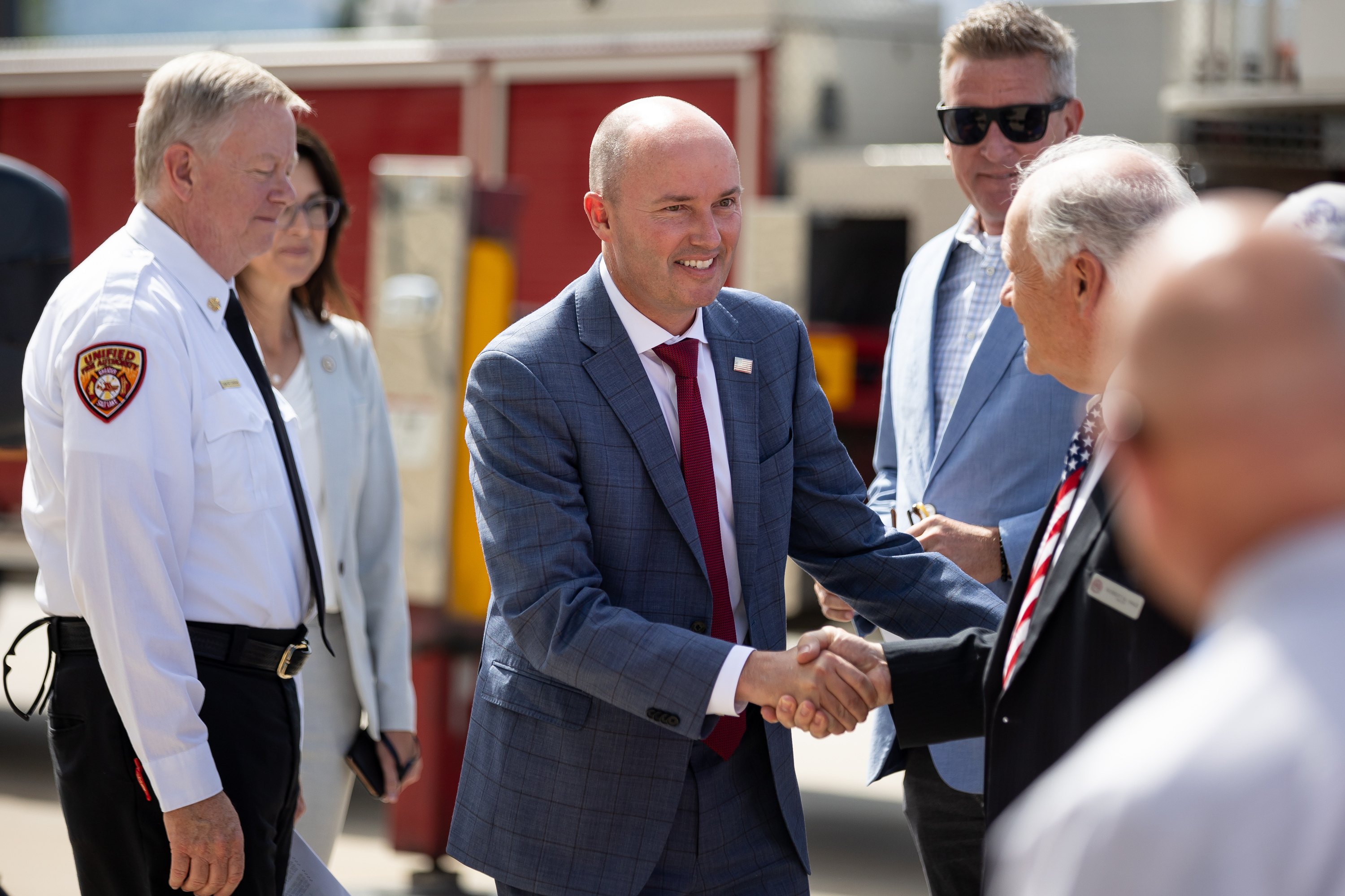 Gov. Spencer Cox greets Midvale Mayor Robert Hale before a press conference at the Capitol in Salt Lake City on Wednesday, June 30, 2021.